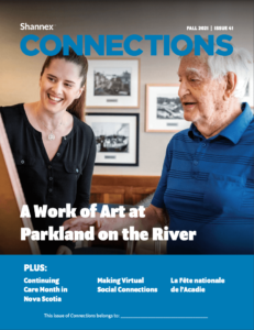 Fall 2021 cover of Shannex Connections magazine with a team member looking over at a resident's piece of art