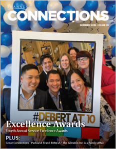 Summer 2019 cover of Shannex Connections magazine with a group of people smiling through a photo frame cut out in front of a balloon archway for the 4th annual Service Excellence awards celebration